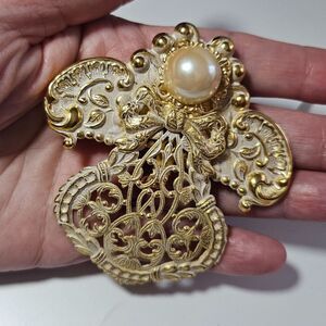Jane gold tone angle brooch